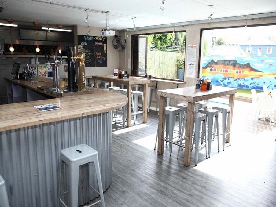 Never At Home Green Point Cape Town Bagian luar foto The interior of the bar
